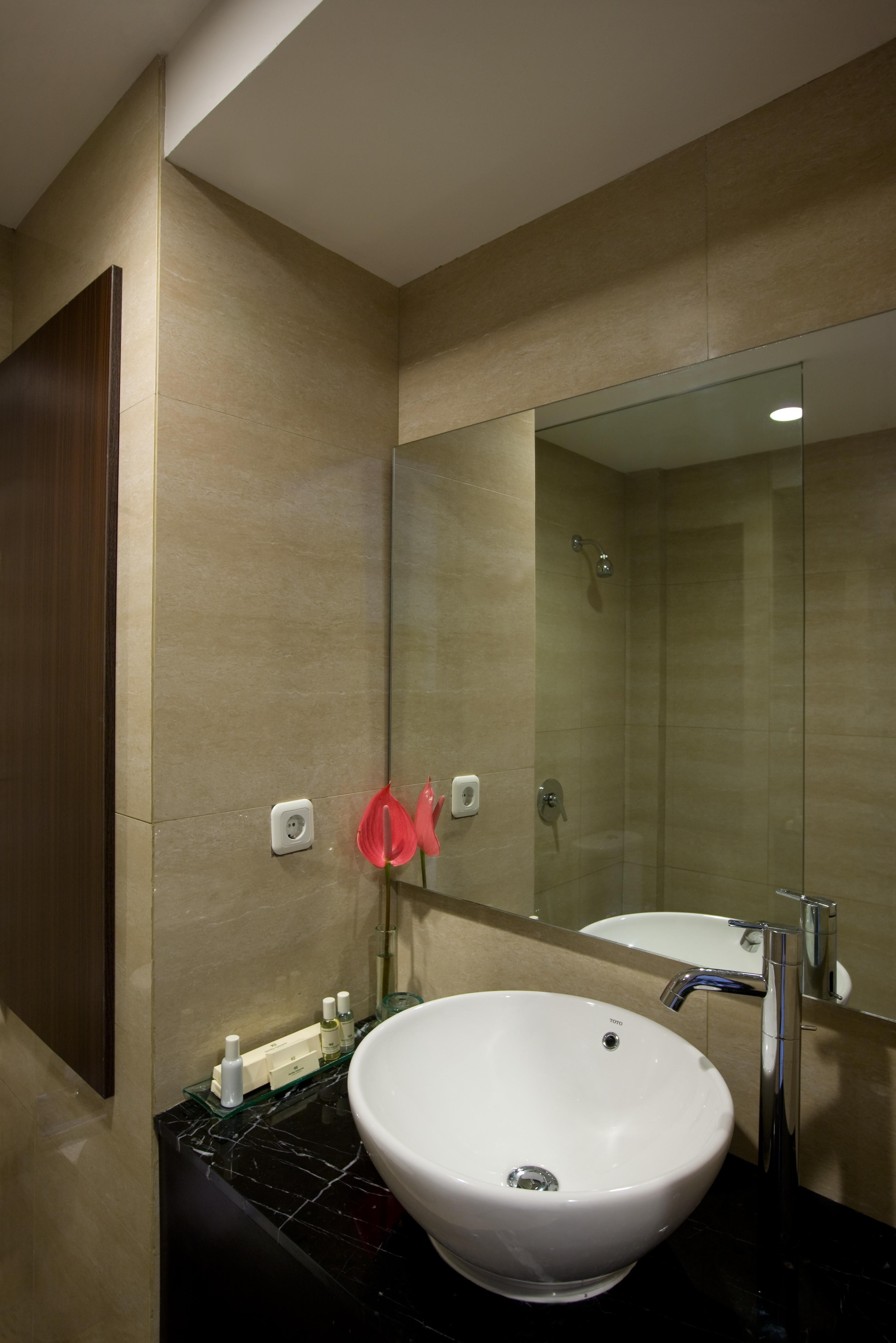 Hotel Santika Kuta Кута Стая снимка