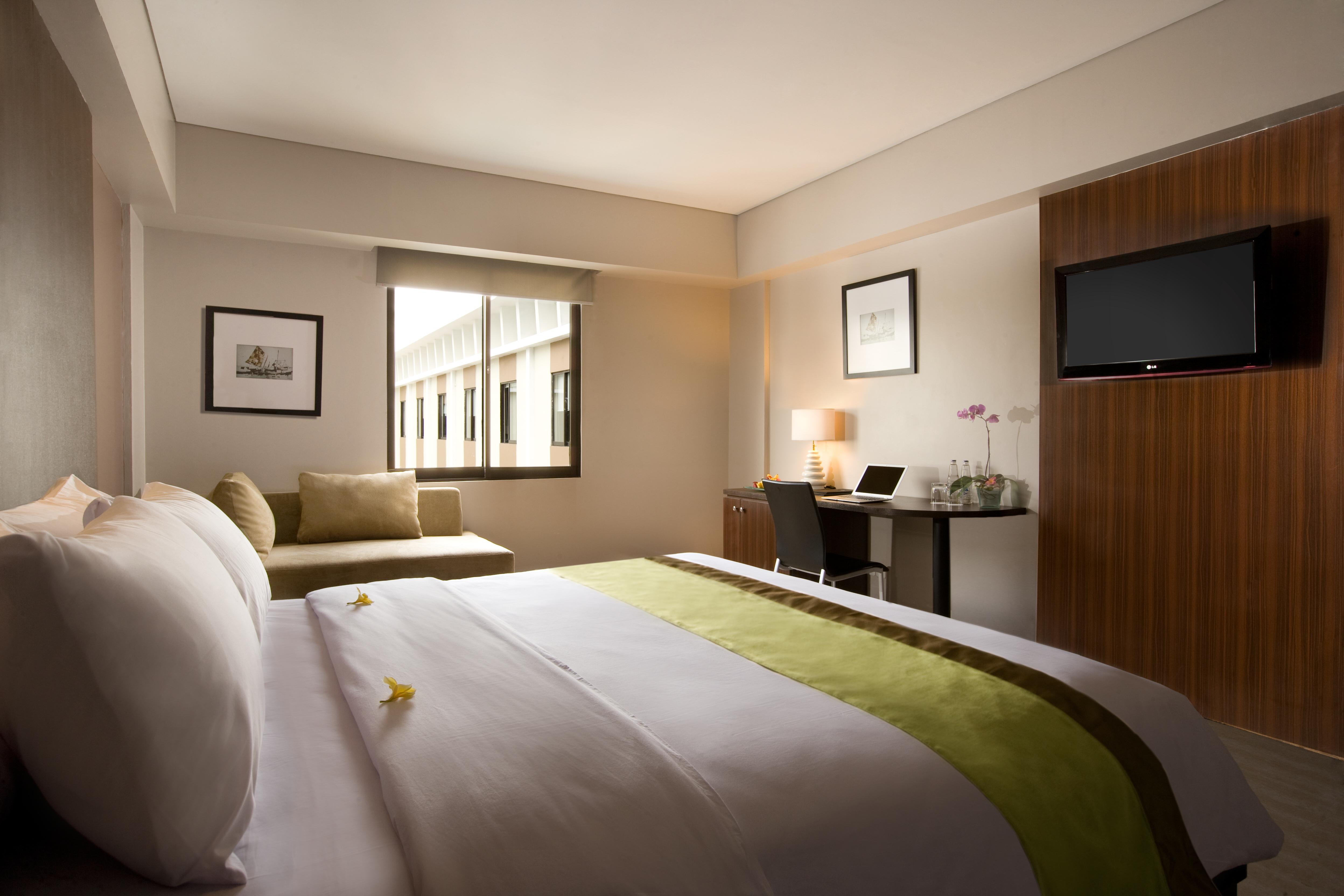 Hotel Santika Kuta Кута Стая снимка